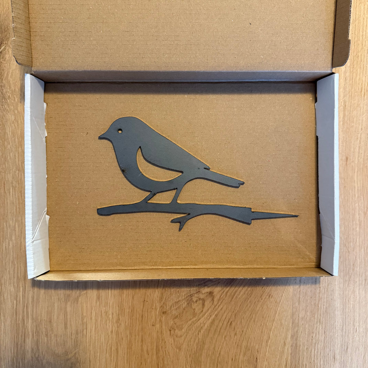Tuinvorm RUDZIK – vogel op tak van cortenstaal, boomdecoratie